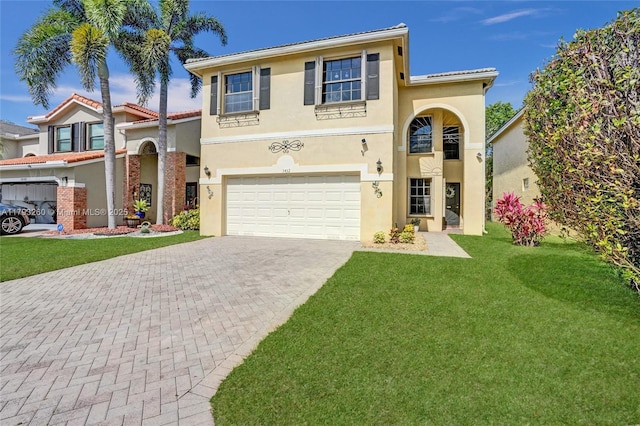 view of front facade featuring decorative driveway, a garage, and stucco siding
