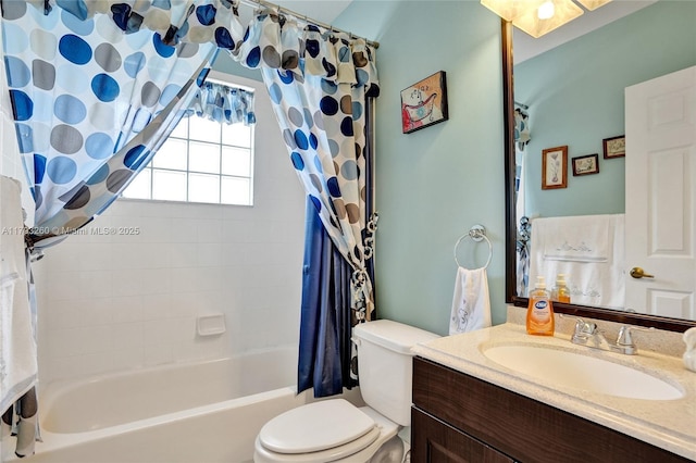 full bath with vanity, shower / tub combo with curtain, and toilet