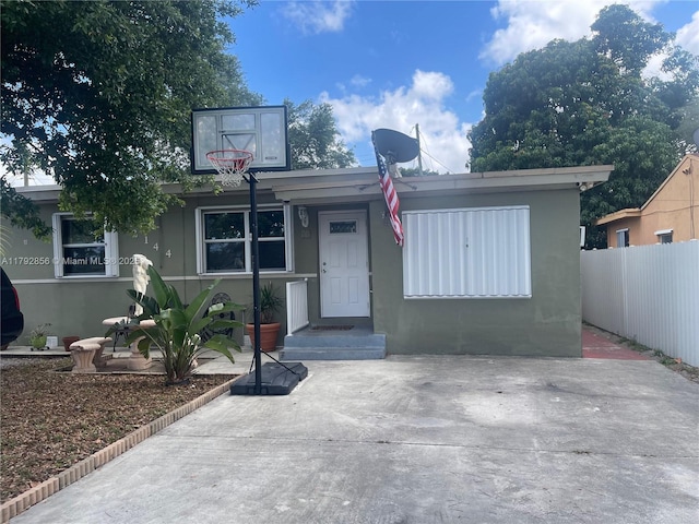 2144 NW 85th St, Miami, FL 33147 - ranch-style home with fence and stucco siding