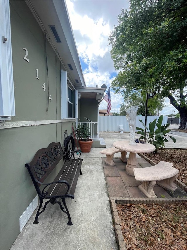 2144 NW 85th St, Miami, FL 33147 - view of patio featuring visible vents and fence