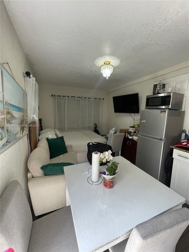 2144 NW 85th St, Miami, FL 33147 - living area with a textured ceiling