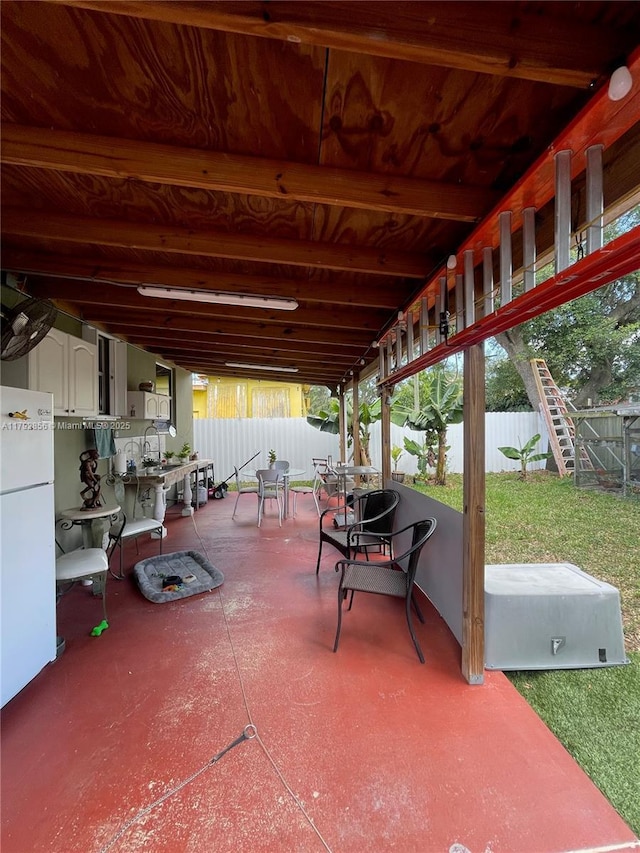 2144 NW 85th St, Miami, FL 33147 - view of patio featuring a fenced backyard