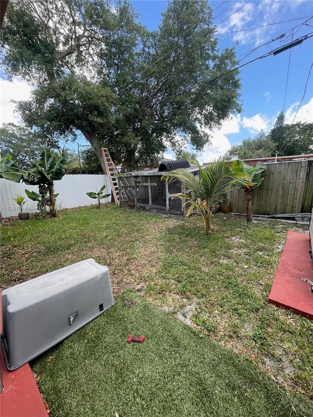 2144 NW 85th St, Miami, FL 33147 - view of yard featuring a fenced backyard