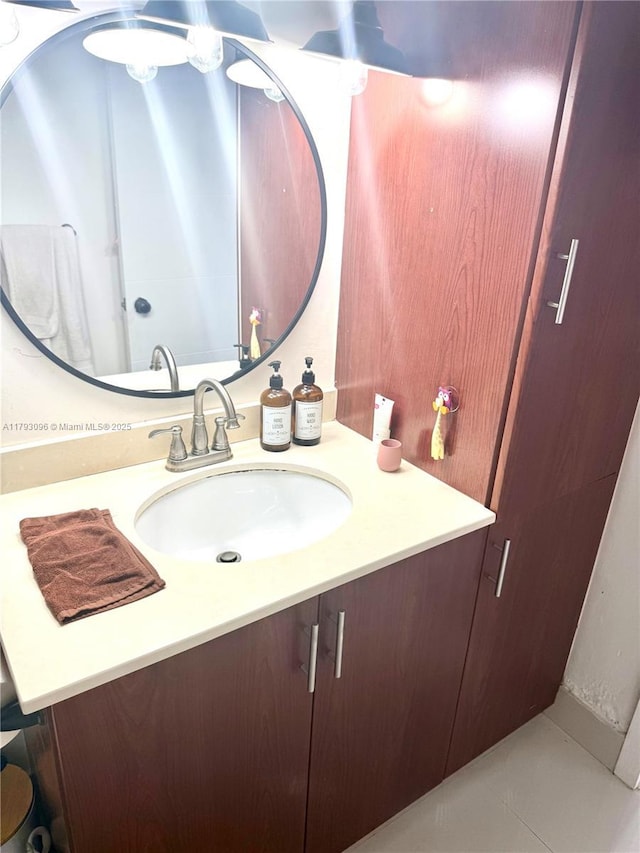 bathroom with vanity and tile patterned flooring