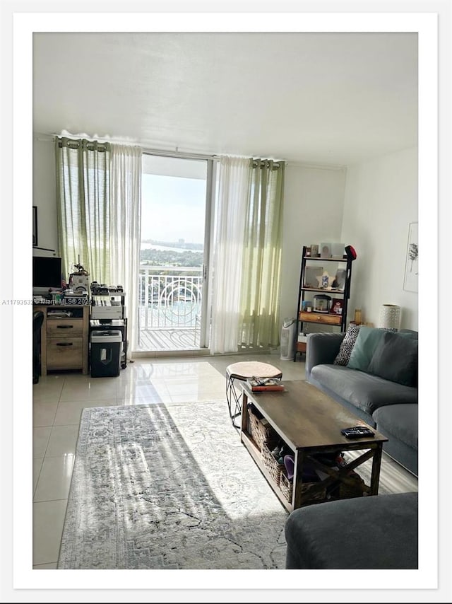 5825 Collins Ave Unit Ph1B, Miami Beach, FL 33140 - living room featuring tile patterned floors