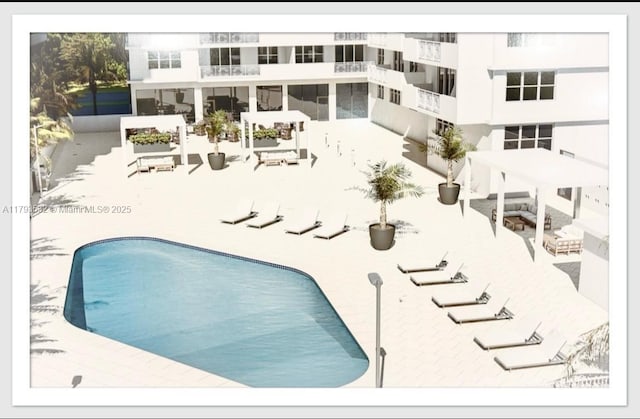 5825 Collins Ave Unit Ph1B, Miami Beach, FL 33140 - pool featuring a patio