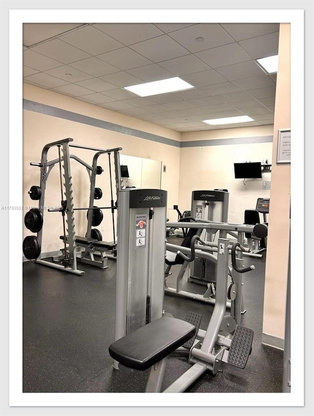 5825 Collins Ave Unit Ph1B, Miami Beach, FL 33140 - exercise room featuring a paneled ceiling