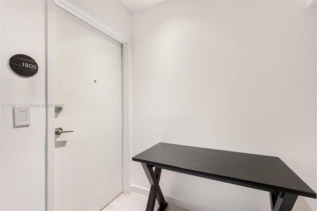 interior space with baseboards