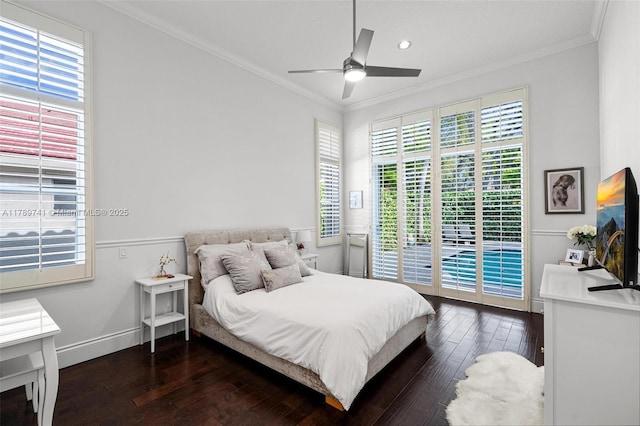 bedroom with crown molding, dark wood finished floors, access to exterior, and multiple windows