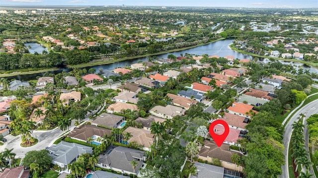 aerial view with a residential view and a water view