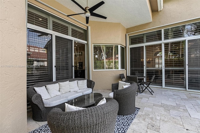 view of patio with ceiling fan and outdoor lounge area