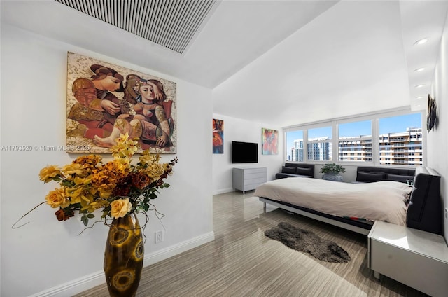 2030 S Ocean Dr Unit 2005, Hallandale Beach, FL 33009 - bedroom with baseboards, wood finished floors, and high vaulted ceiling