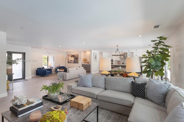 14405 SW 84th Ct, Palmetto Bay, FL 33158 - living room with a chandelier, visible vents, and recessed lighting