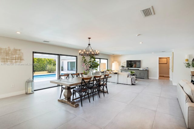14405 SW 84th Ct, Palmetto Bay, FL 33158 - dining space featuring an inviting chandelier, light tile patterned floors, baseboards, and visible vents