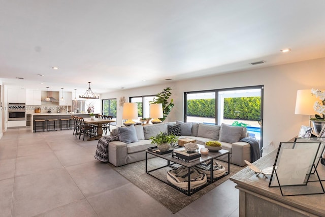 14405 SW 84th Ct, Palmetto Bay, FL 33158 - living room featuring recessed lighting, concrete floors, and visible vents