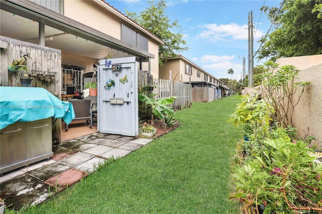 view of yard featuring fence