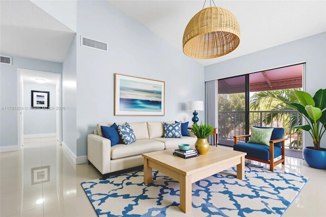 15520 SW 80th St Unit B-301, Miami, FL 33193 - living room featuring high vaulted ceiling and baseboards