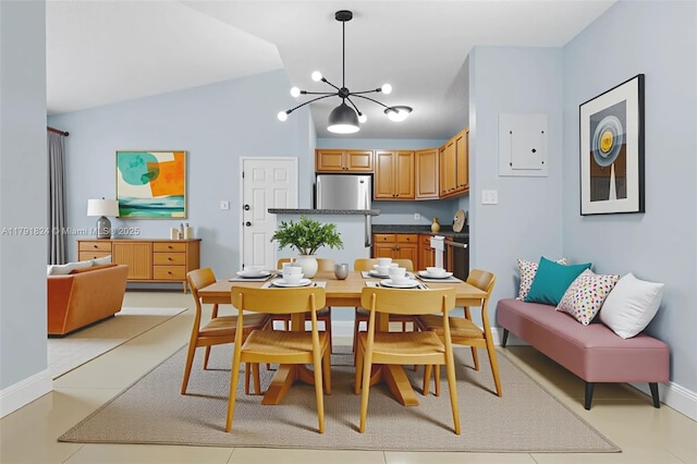 15520 SW 80th St Unit B-301, Miami, FL 33193 - dining room featuring a chandelier and vaulted ceiling