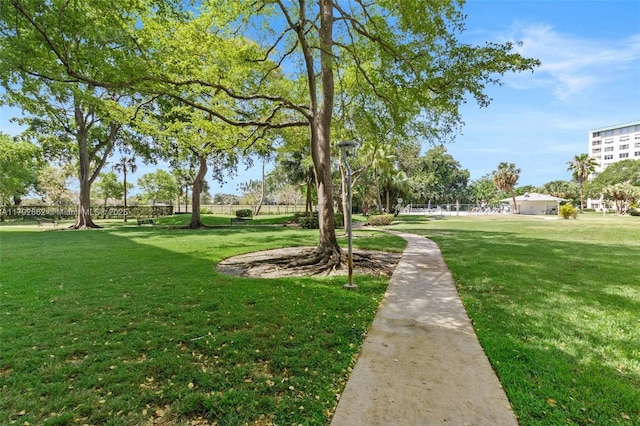 surrounding community featuring a yard