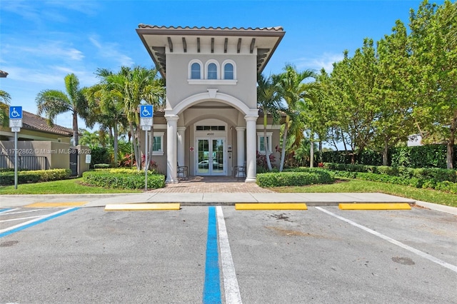 uncovered parking lot with french doors