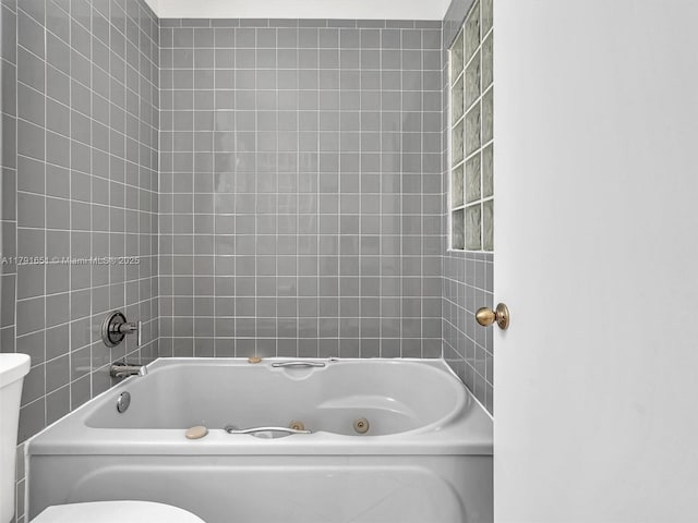 bathroom featuring toilet