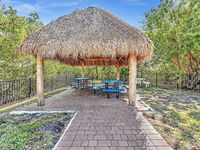 view of patio featuring a gazebo and a fenced backyard