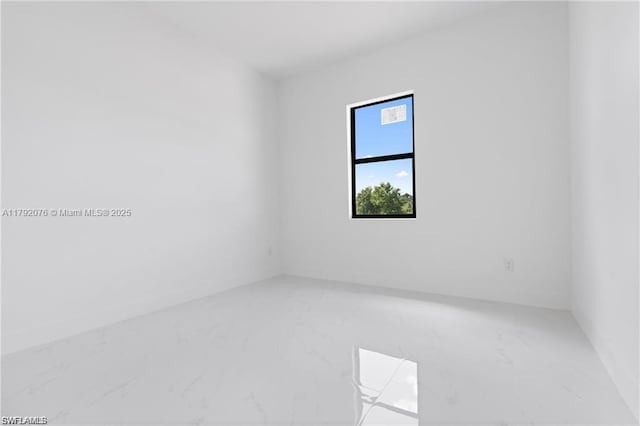 3203 Sunshine Blvd N, Lehigh Acres, FL 33971 - unfurnished room with baseboards and marble finish floor