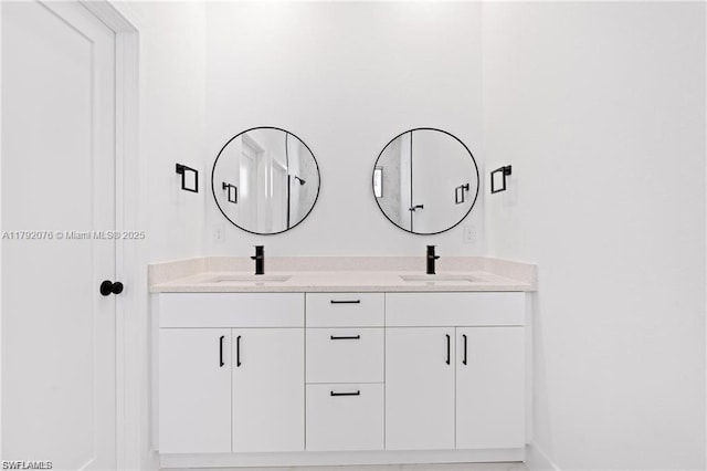 3203 Sunshine Blvd N, Lehigh Acres, FL 33971 - full bathroom with double vanity and a sink