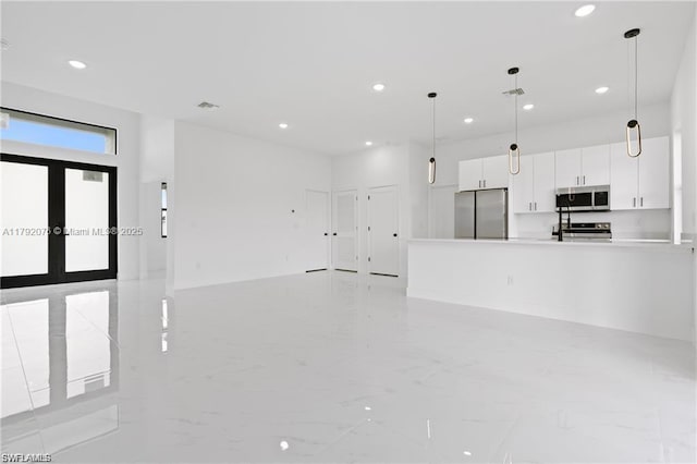 3203 Sunshine Blvd N, Lehigh Acres, FL 33971 - interior space featuring visible vents, recessed lighting, and marble finish floor