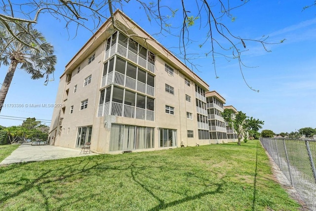 view of property featuring fence
