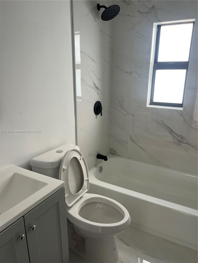 full bathroom featuring vanity, toilet, and bathing tub / shower combination