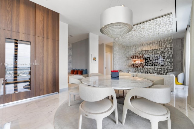 17141 Collins Ave Unit 3002, Sunny Isles Beach, FL 33160 - dining area with a fireplace