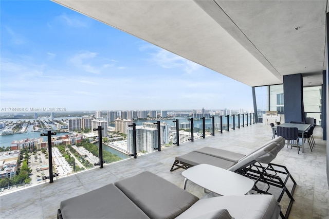 17141 Collins Ave Unit 3002, Sunny Isles Beach, FL 33160 - view of patio / terrace featuring a view of city, a water view, and a balcony