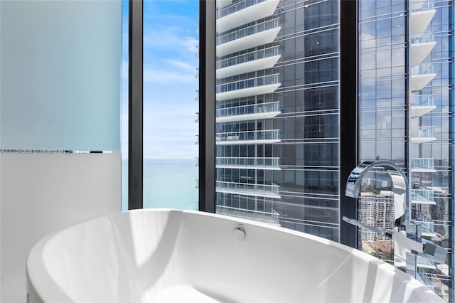 17141 Collins Ave Unit 3002, Sunny Isles Beach, FL 33160 - full bath featuring a water view and a soaking tub