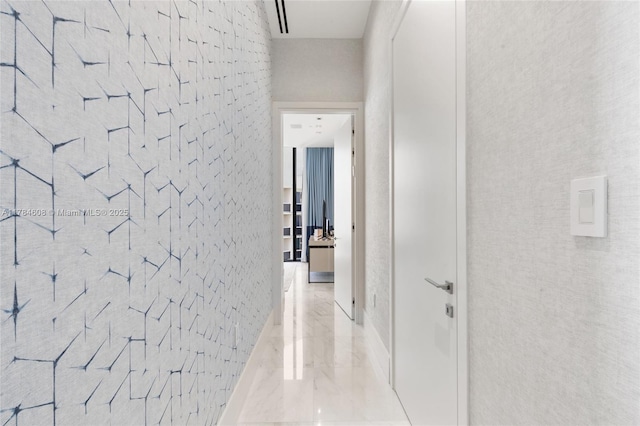 17141 Collins Ave Unit 3002, Sunny Isles Beach, FL 33160 - hallway featuring baseboards and marble finish floor