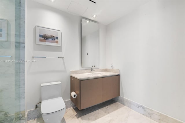 17141 Collins Ave Unit 3002, Sunny Isles Beach, FL 33160 - bathroom with vanity, toilet, a marble finish shower, marble finish floor, and baseboards