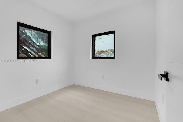 1814 NW 2nd Ct, Miami, FL 33136 - spare room with light wood finished floors and baseboards