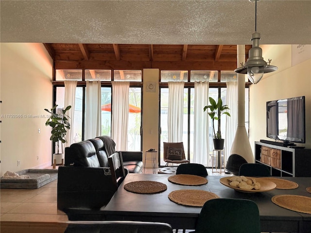dining area featuring wooden ceiling and beamed ceiling