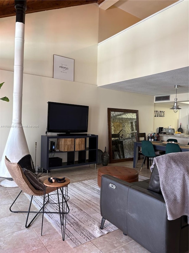 tiled living area with visible vents