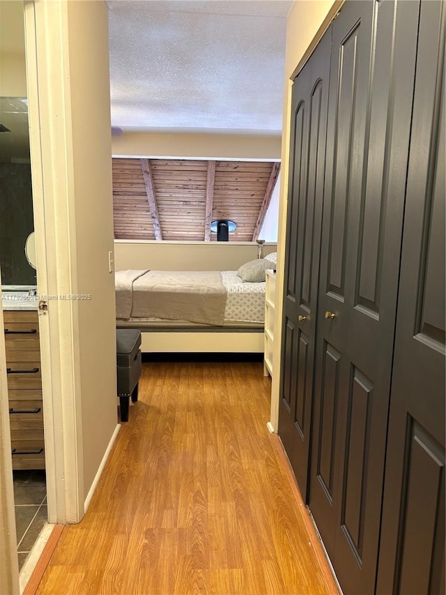 bedroom featuring wood finished floors