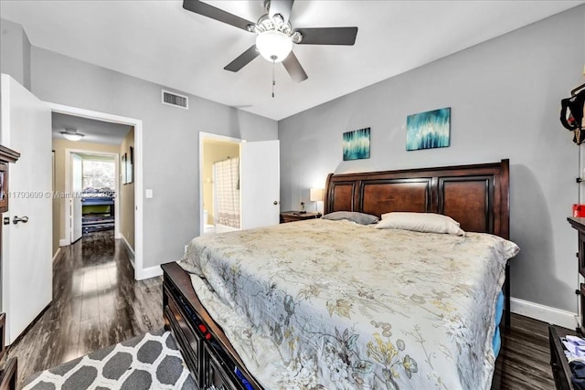 bedroom featuring a ceiling fan, baseboards, visible vents, and dark wood-type flooring