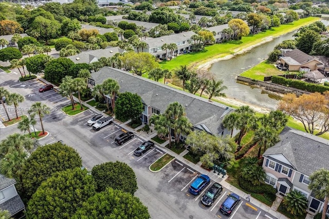 aerial view with a water view and a residential view