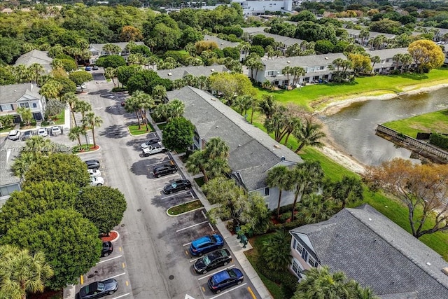aerial view featuring a water view and a residential view