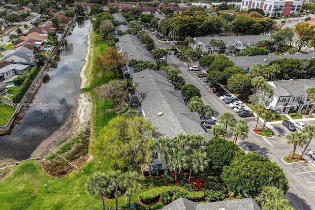 aerial view featuring a water view and a residential view