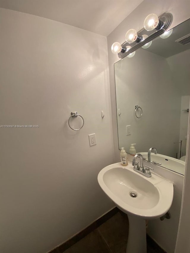 1525 Pennsylvania Ave Unit 5, Miami Beach, FL 33139 - bathroom featuring visible vents and a sink