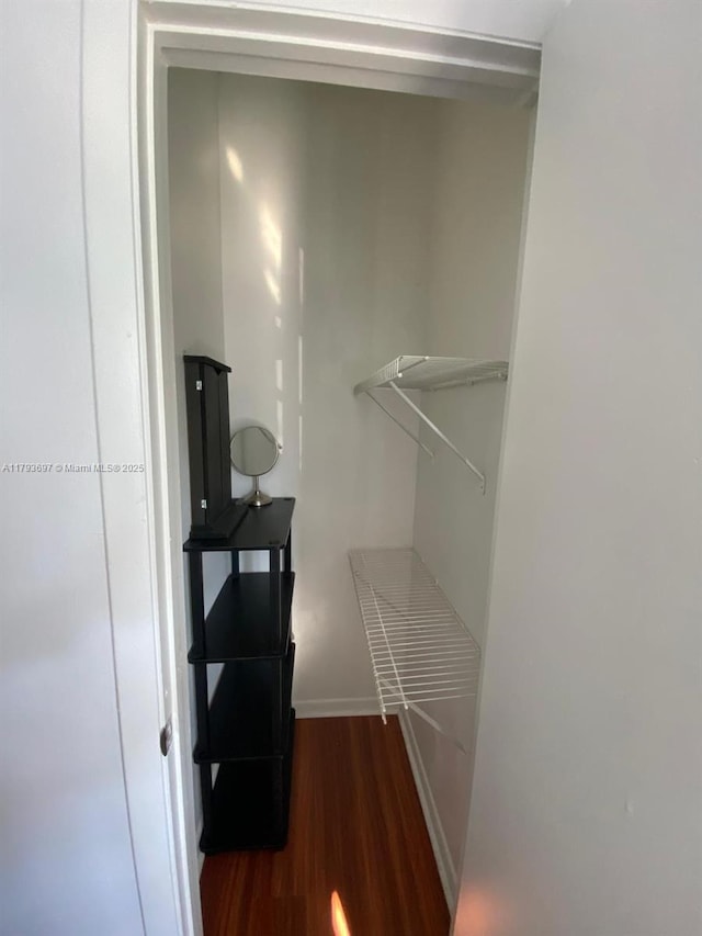1525 Pennsylvania Ave Unit 5, Miami Beach, FL 33139 - walk in closet featuring dark wood-style flooring
