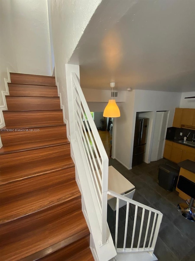1525 Pennsylvania Ave Unit 5, Miami Beach, FL 33139 - staircase featuring visible vents