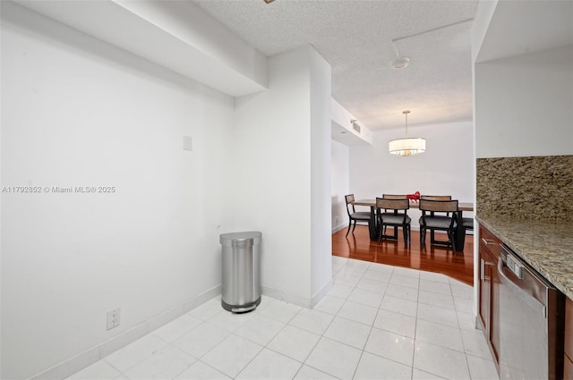 19101 NE 36th Ct Unit 2509, Aventura, FL 33180 - interior space with light tile patterned floors, baseboards, and a textured ceiling