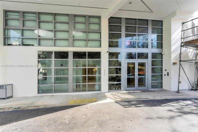 6101 Aqua Ave Unit 103, Miami Beach, FL 33141 - entrance to property with french doors and stucco siding