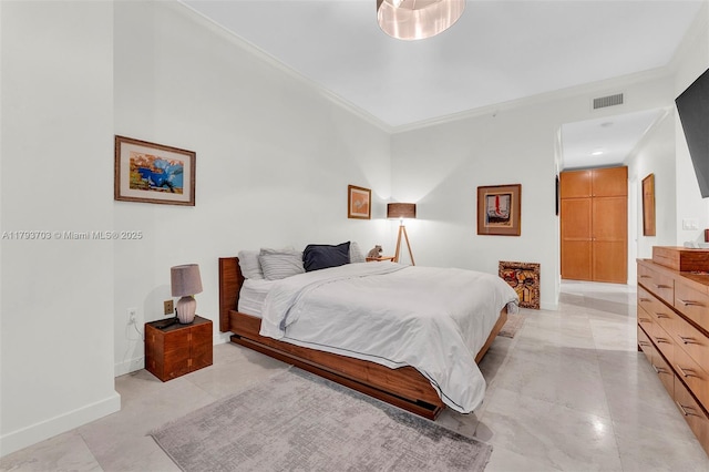 bedroom featuring baseboards, ornamental molding, and visible vents
